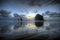 Haystacks_at_sunset
