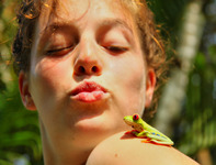 Kissing-a-beautiful-green-tree-frog-in-costa-rica
