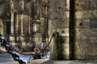 Sitting-in-mercanti-square-in-milan