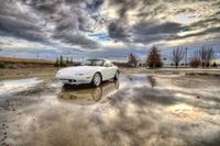 Miata-against-a-cloudy-sky