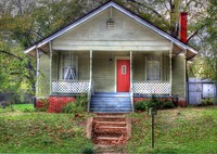 Little-green-house-with-the-odd-red-door