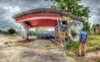 The-artist-admires-the-work-