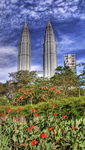 The-petronas-towers-and-the-lake-garden
